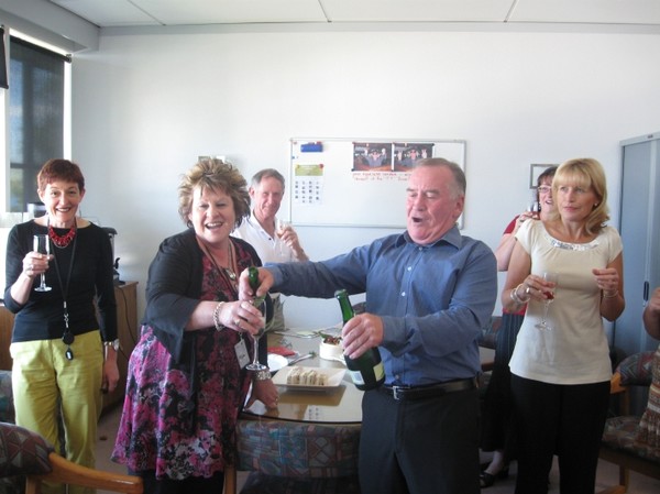 Mayor Rick Cooper pops the champagne with Cr Doreen Blyth